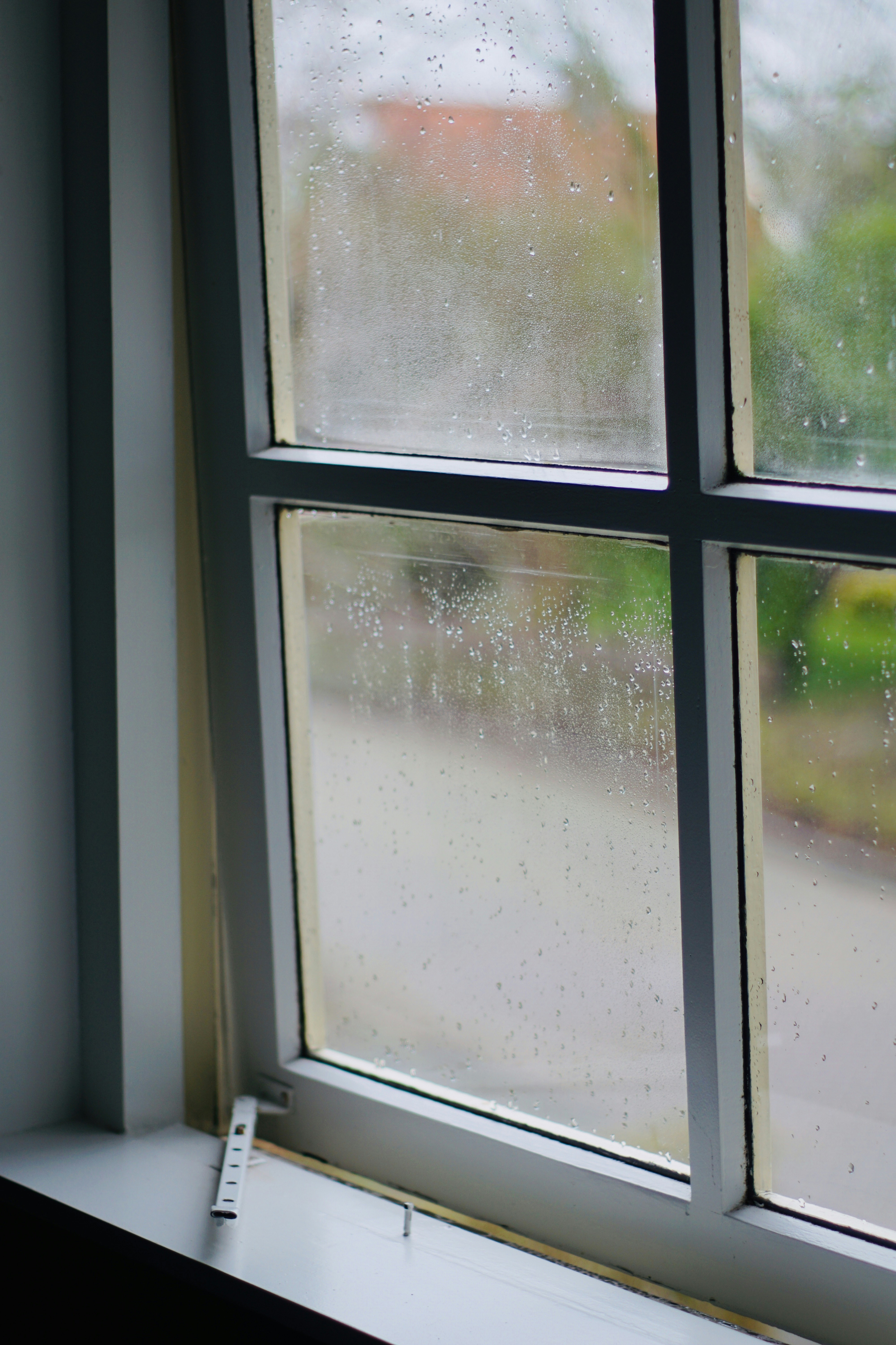 white wooden framed glass window during daytime