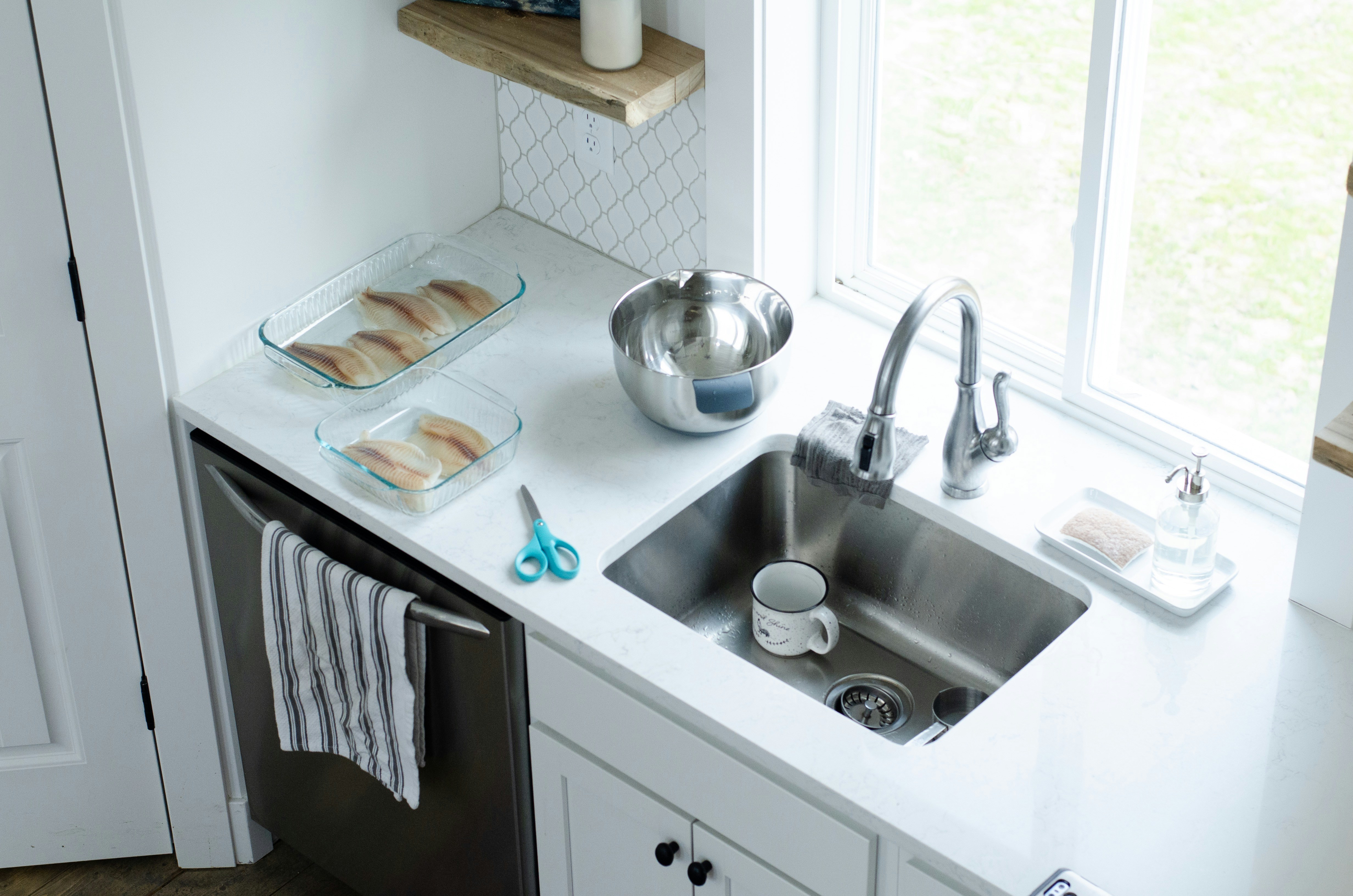 Kitchen sink under cabinet storage