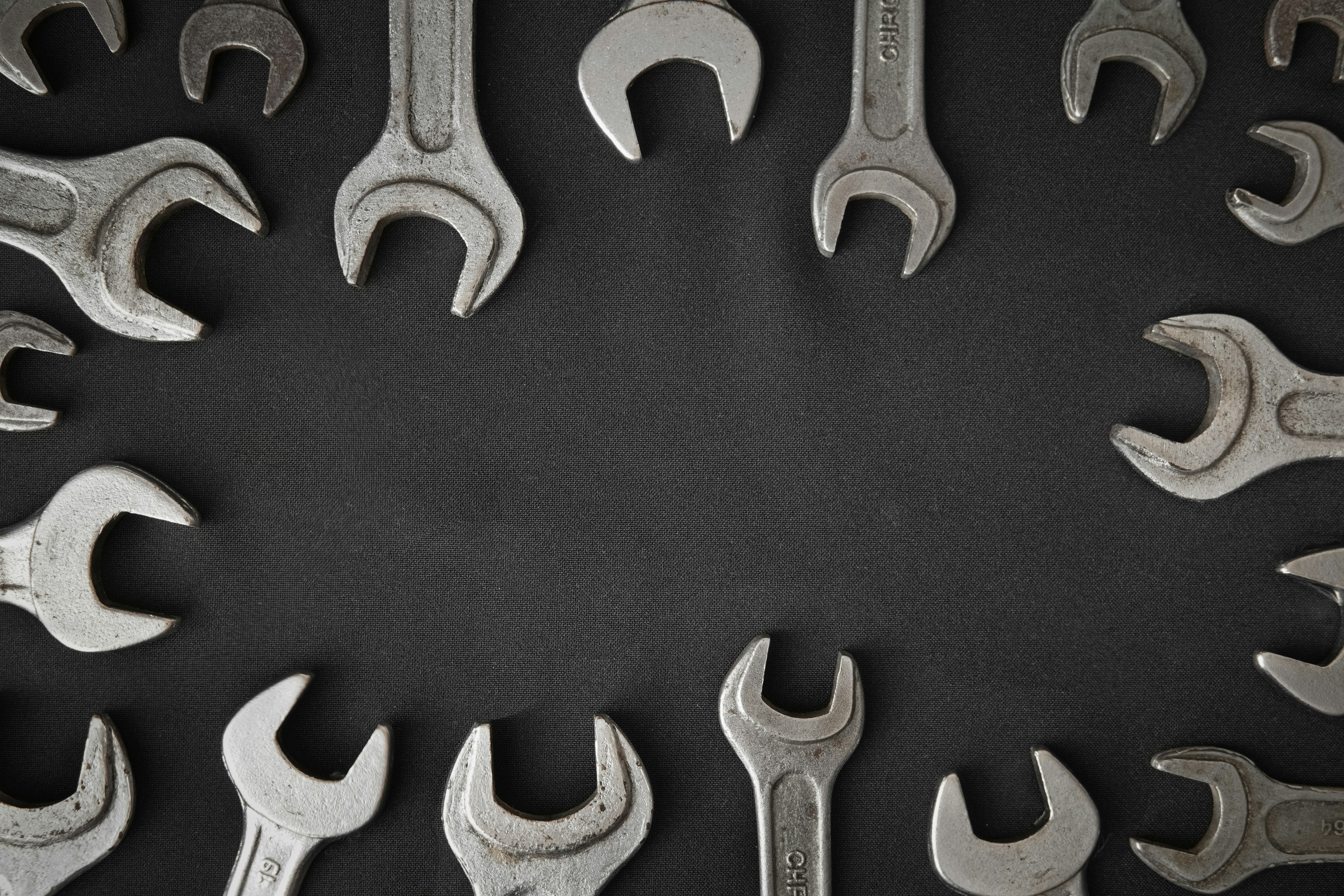 a group of wrenches arranged in a circle