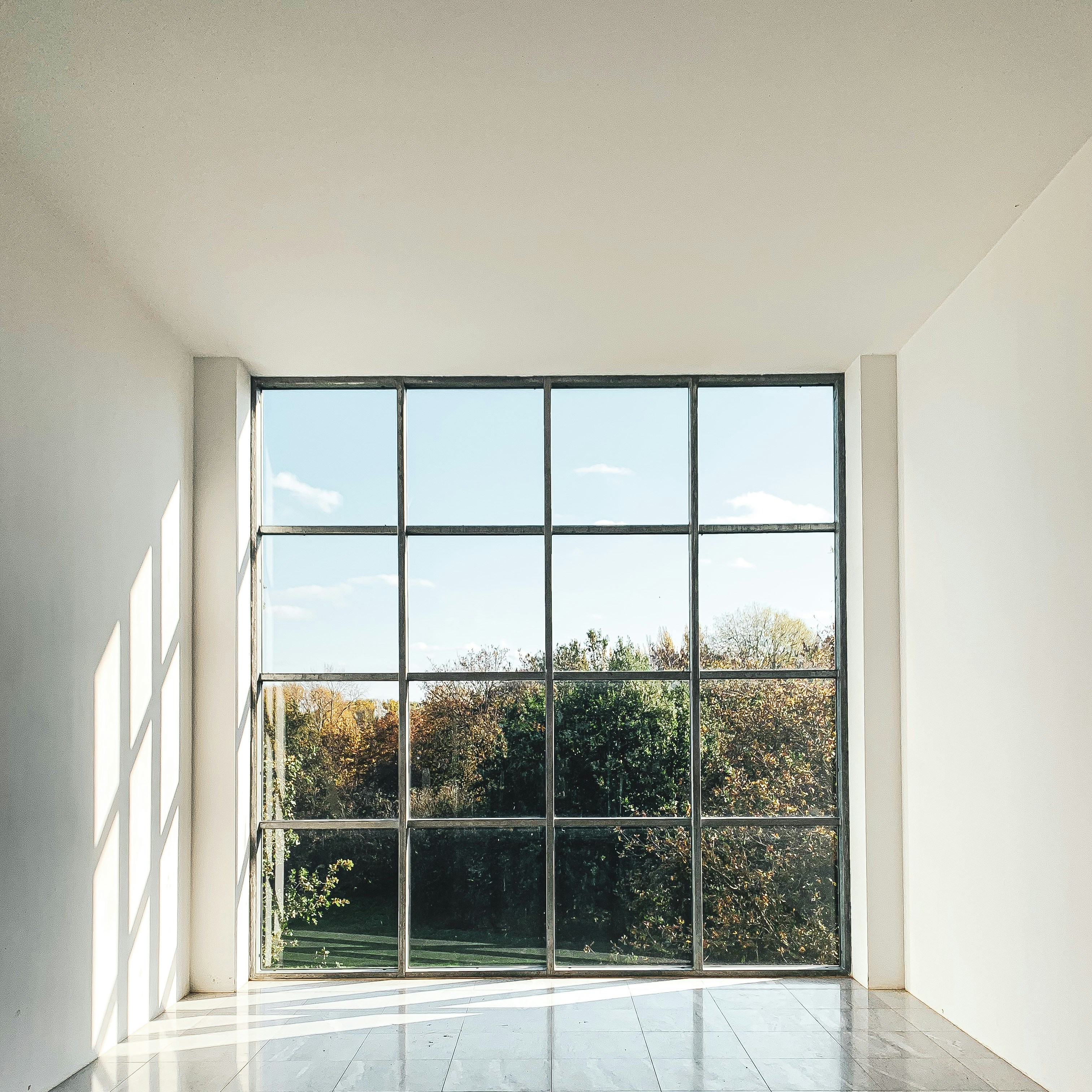 white framed glass window during daytime