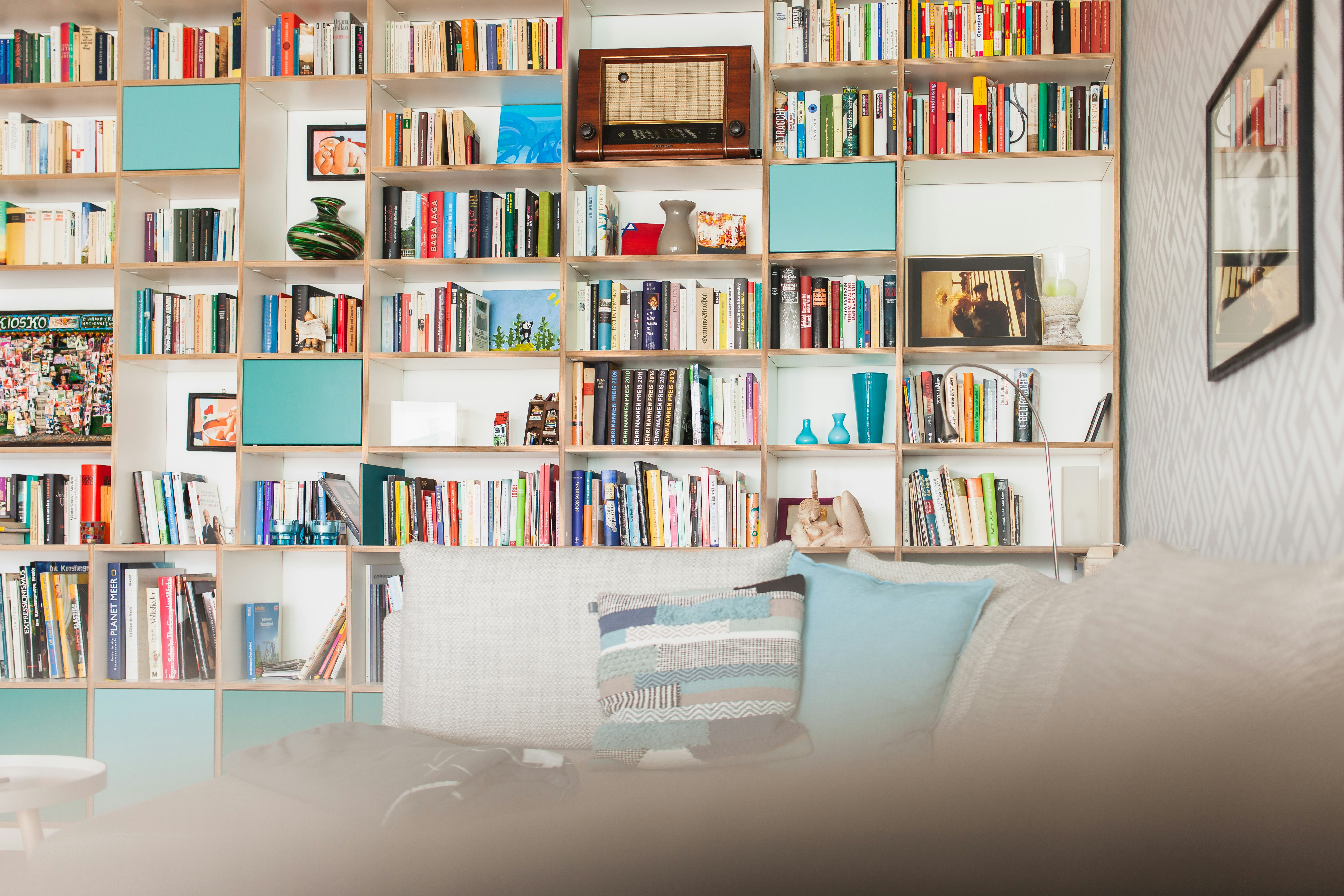 white wooden book shelf with books