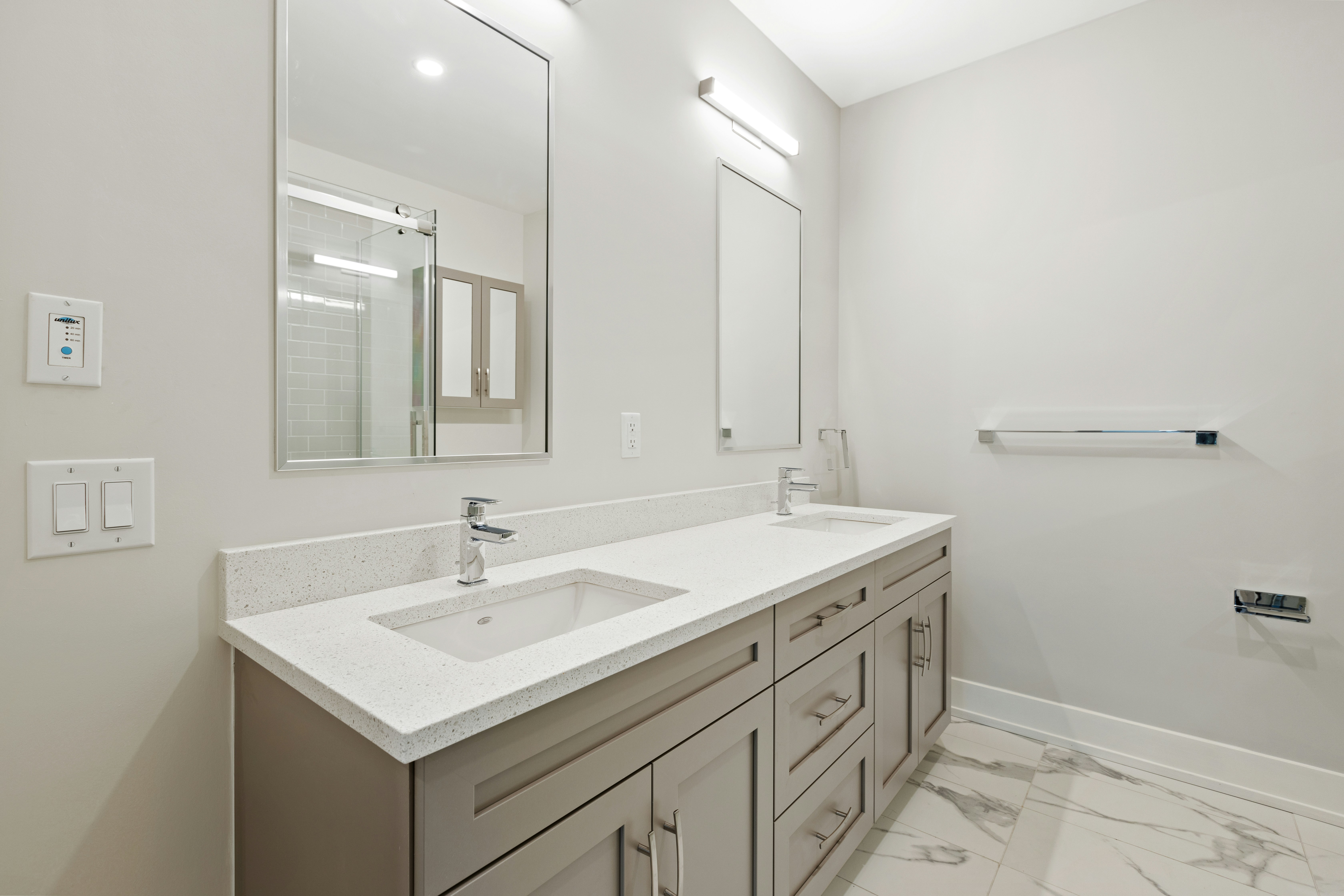 white ceramic sink with stainless steel faucet
