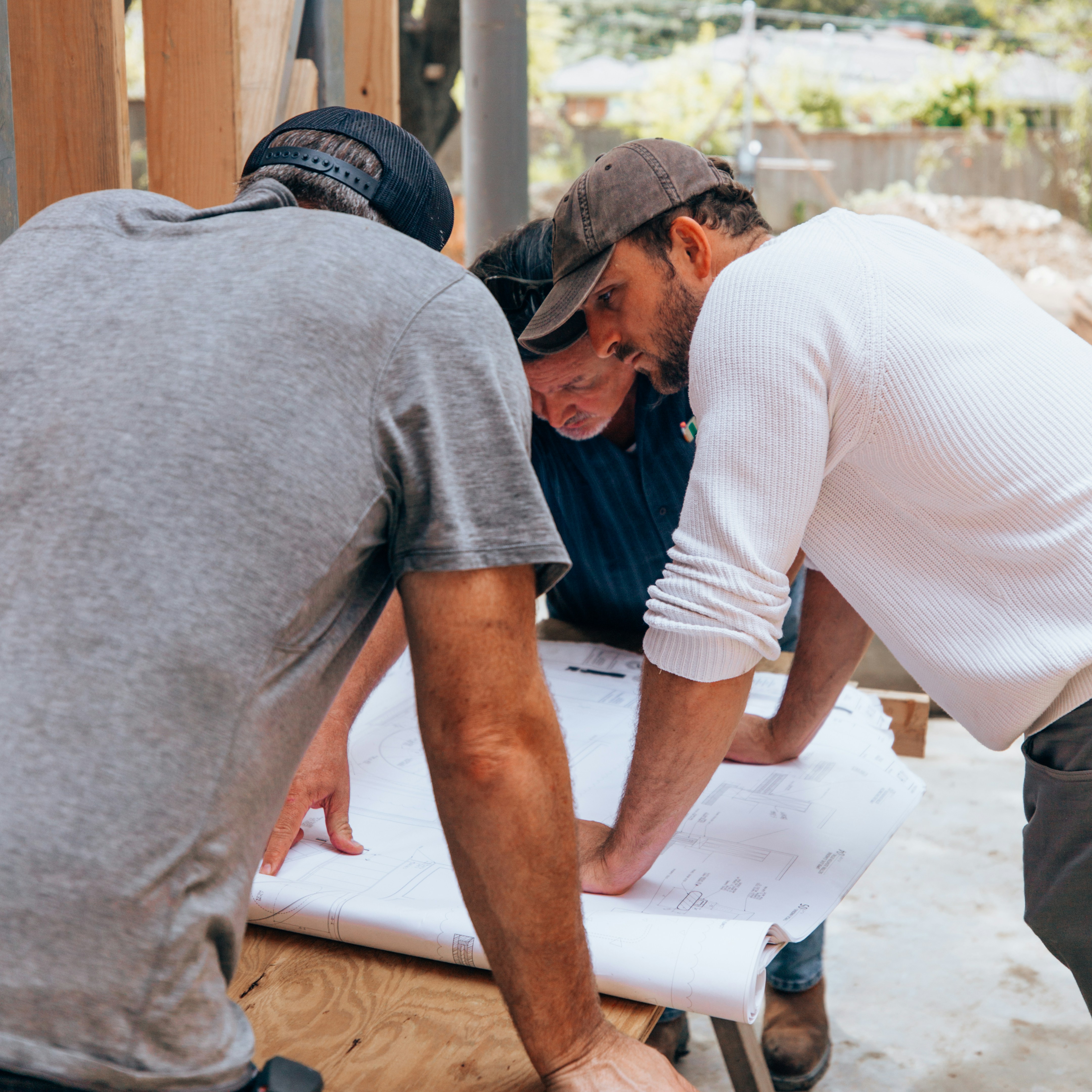 a group of men working on a project