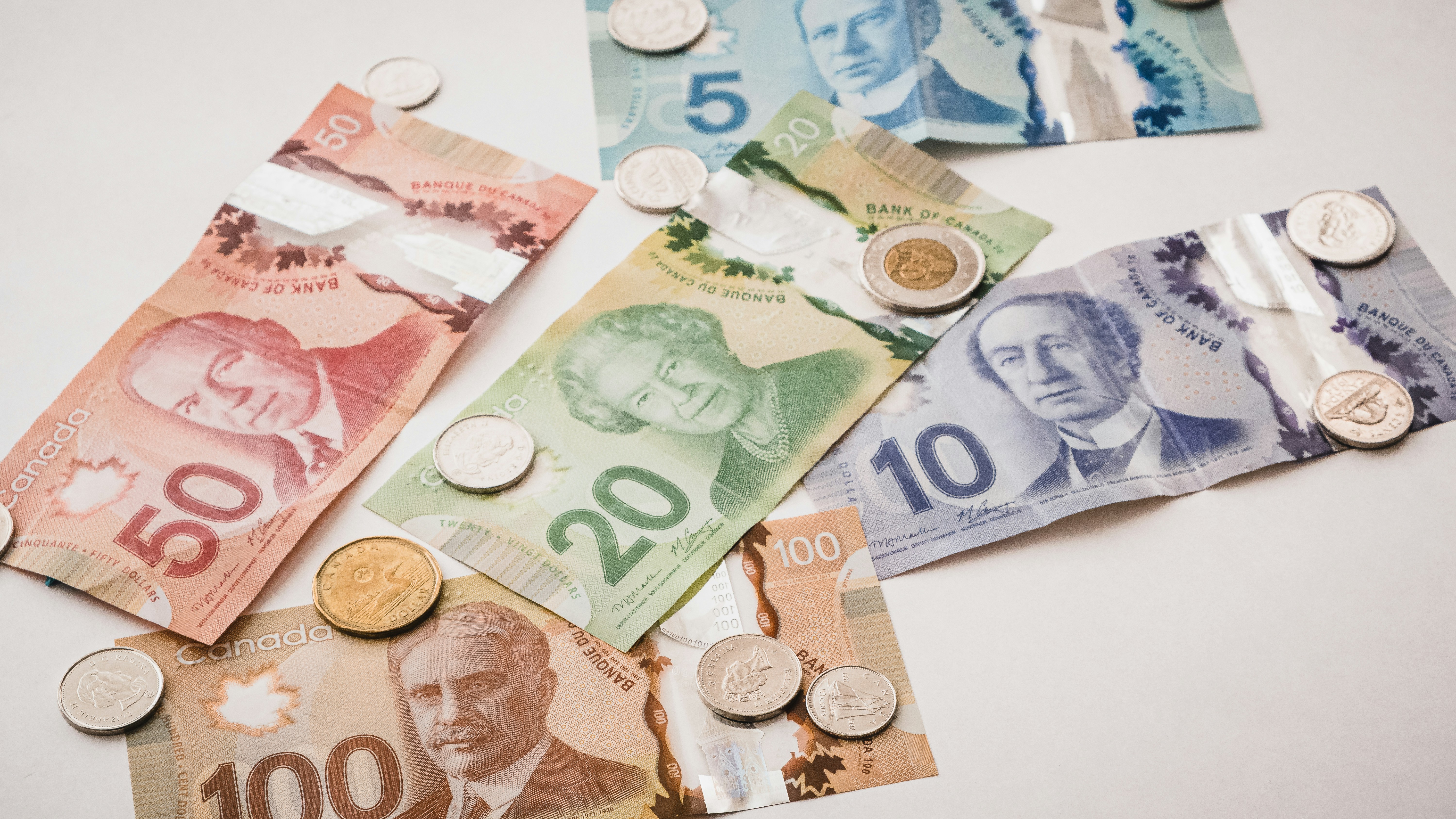 a bunch of money sitting on top of a table
