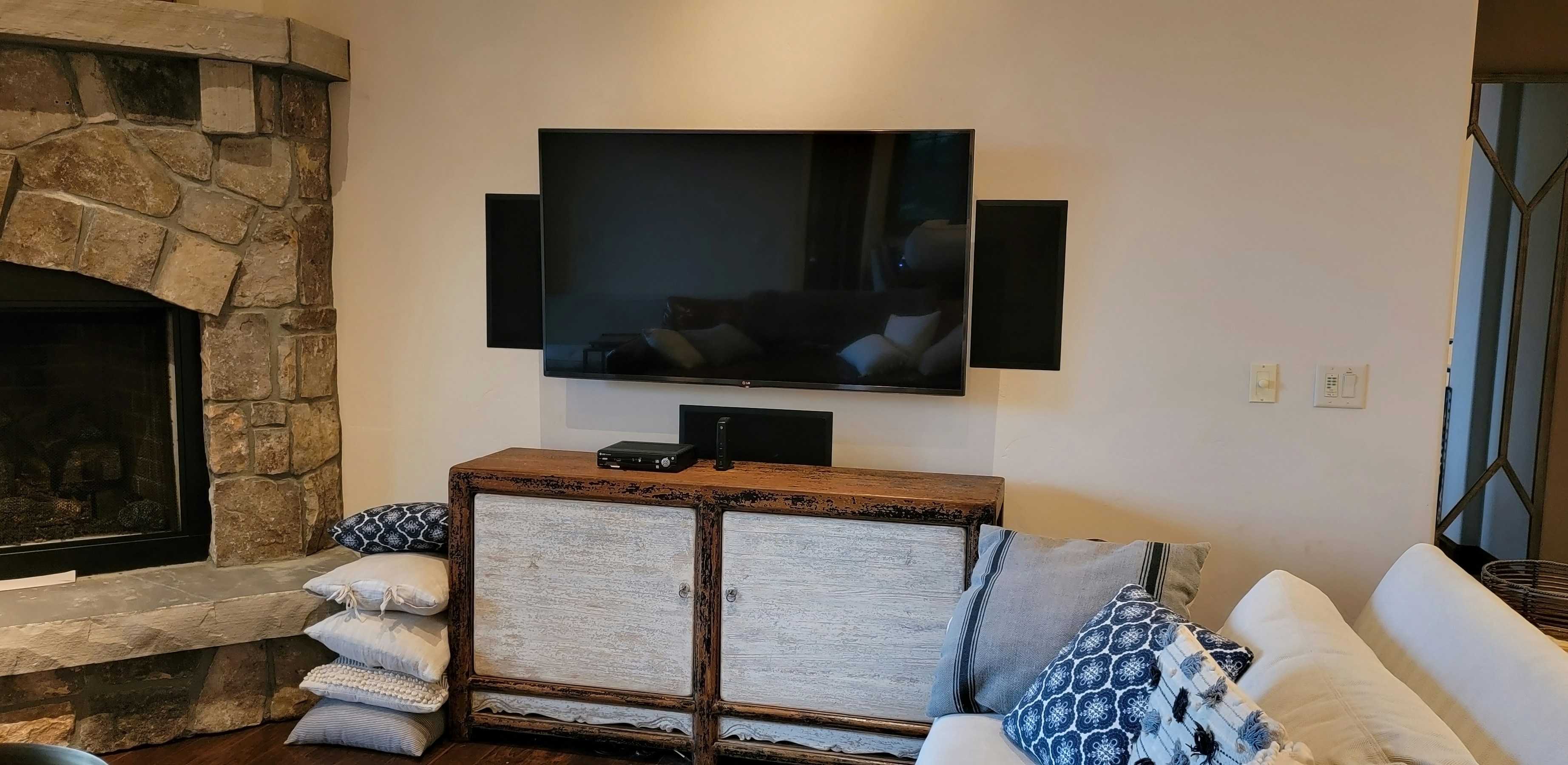 man mounting a tv