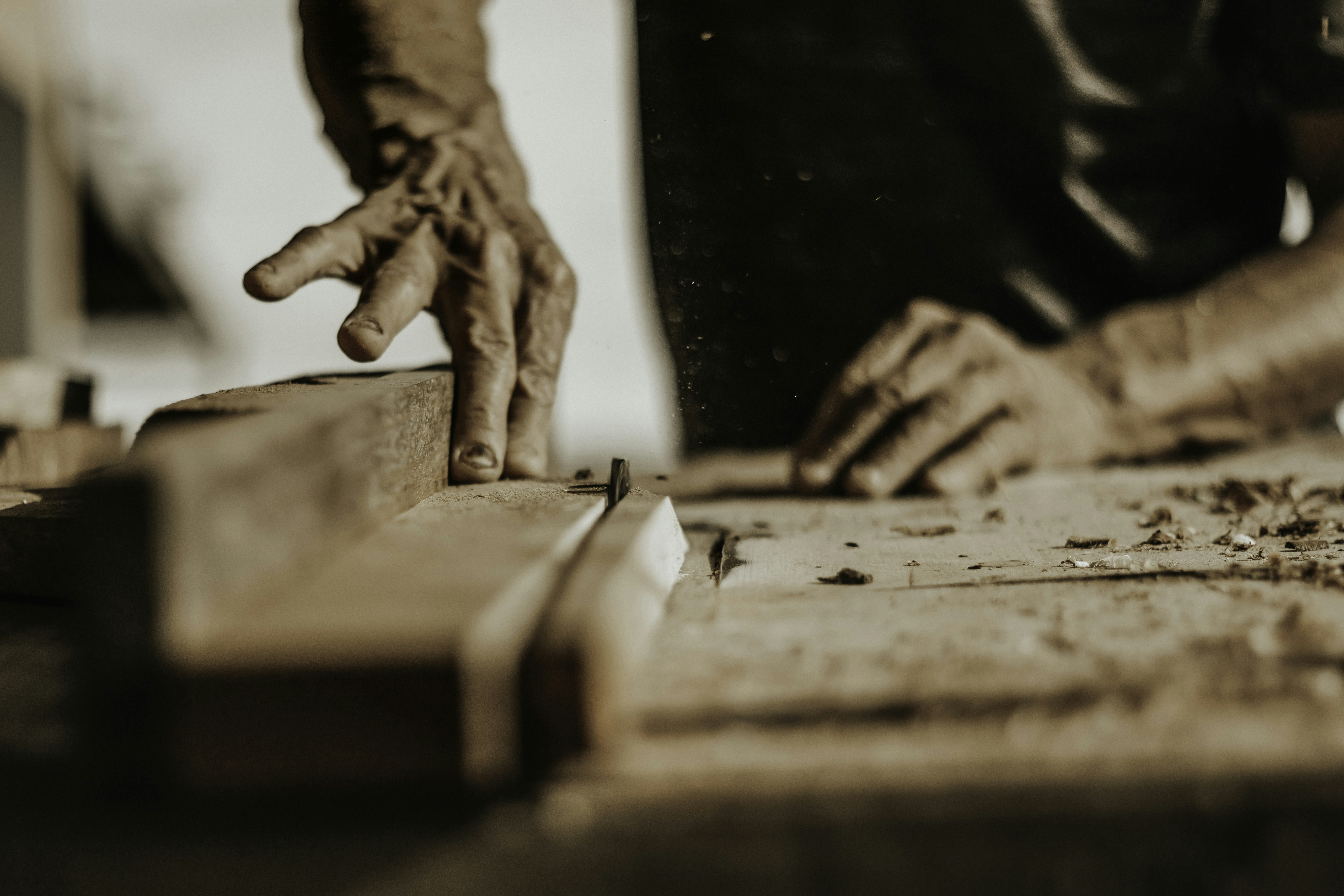a person is working on a piece of wood