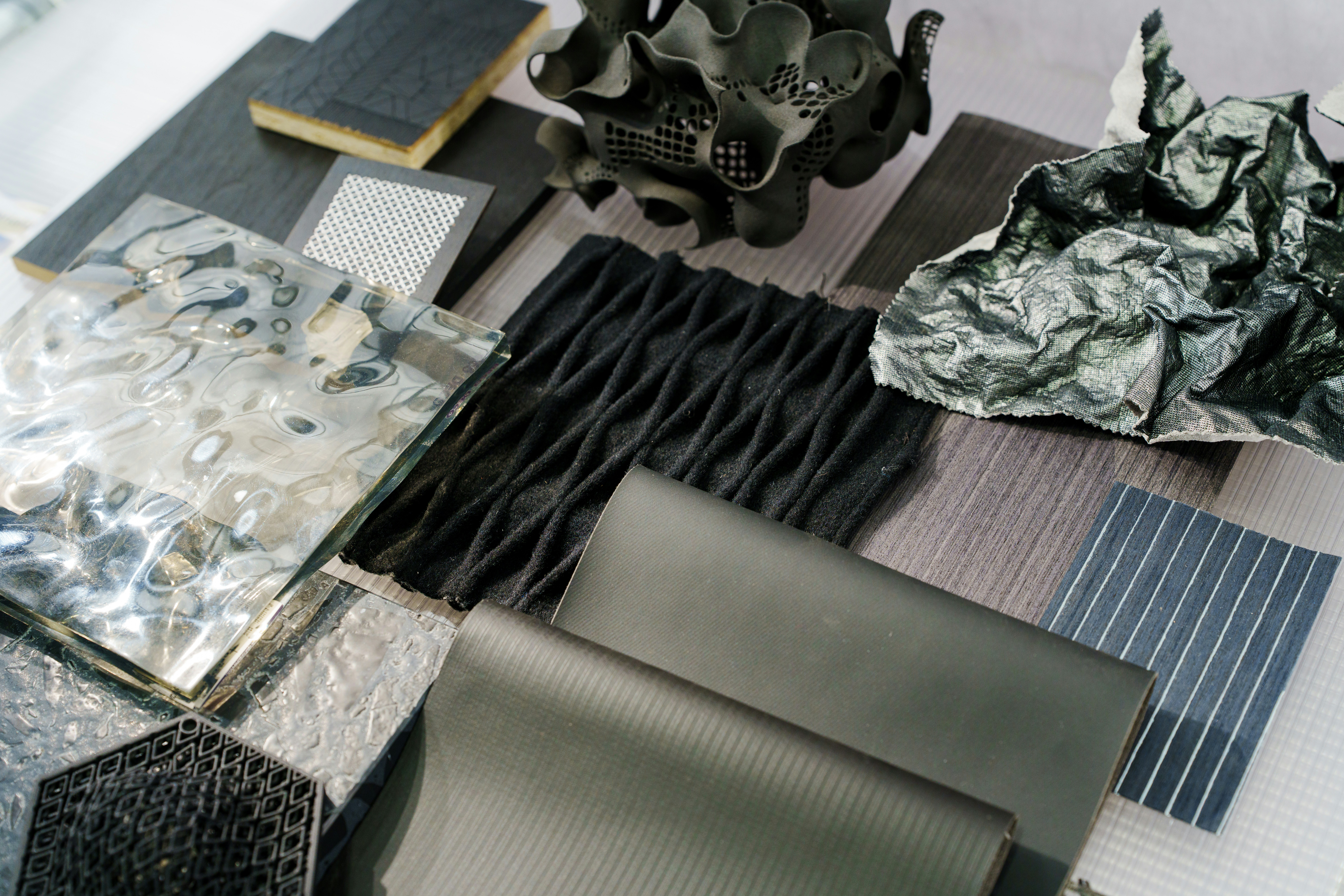 A collection of various grey, textured materials.